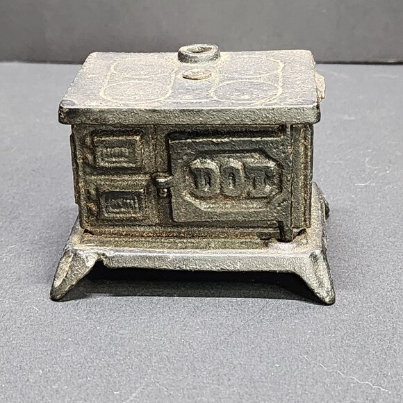 Vintage Miniature Dot Cook Cast Iron Stove Coin Bank Black Antique - Picture 1 of 9